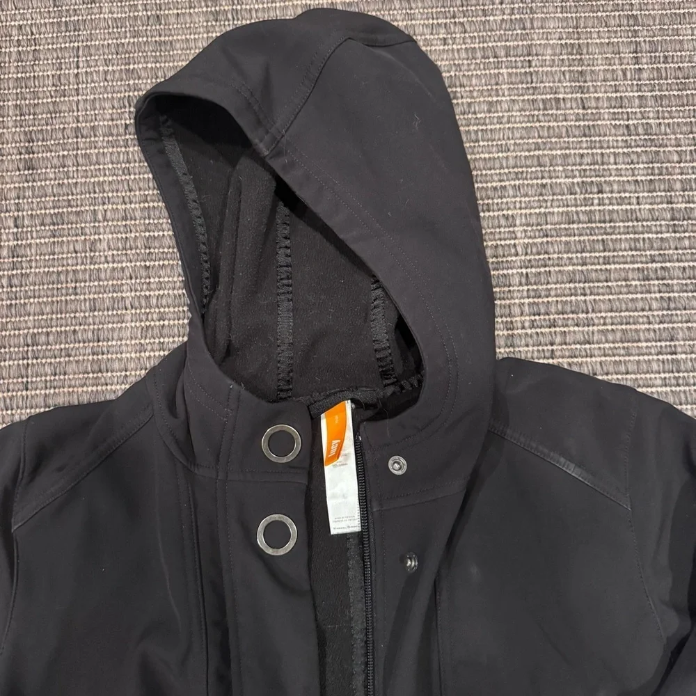 Lucy Black Hooded Softshell Jacket with Orange Brand Tag